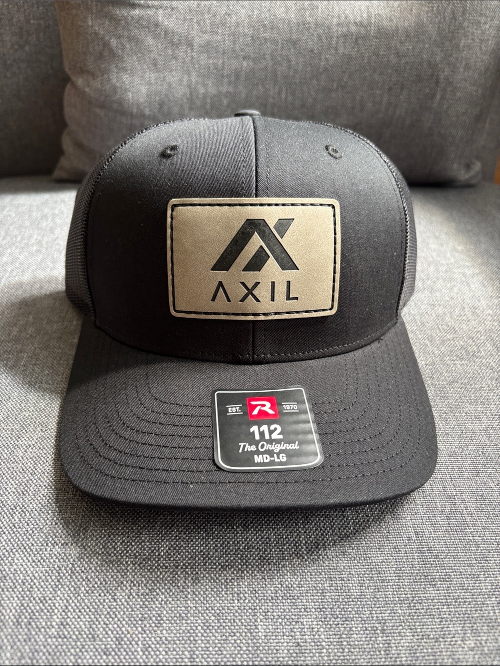 Men's Black Trucker Cap with Tan Logo Patch